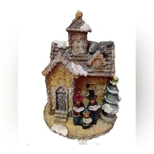 Festive Village House with Carolers